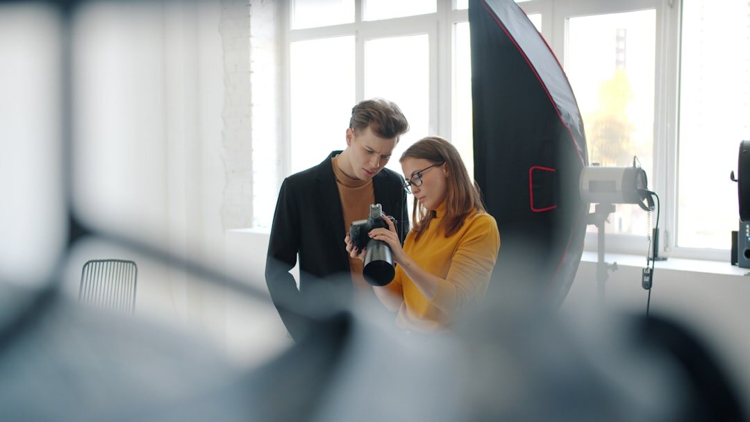 Presenter rehearsing lines while looking at a camera lens in a studio