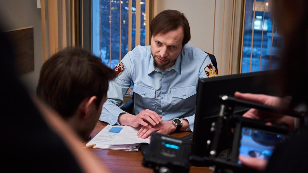 Small group of reporters reviewing notes together before a broadcast