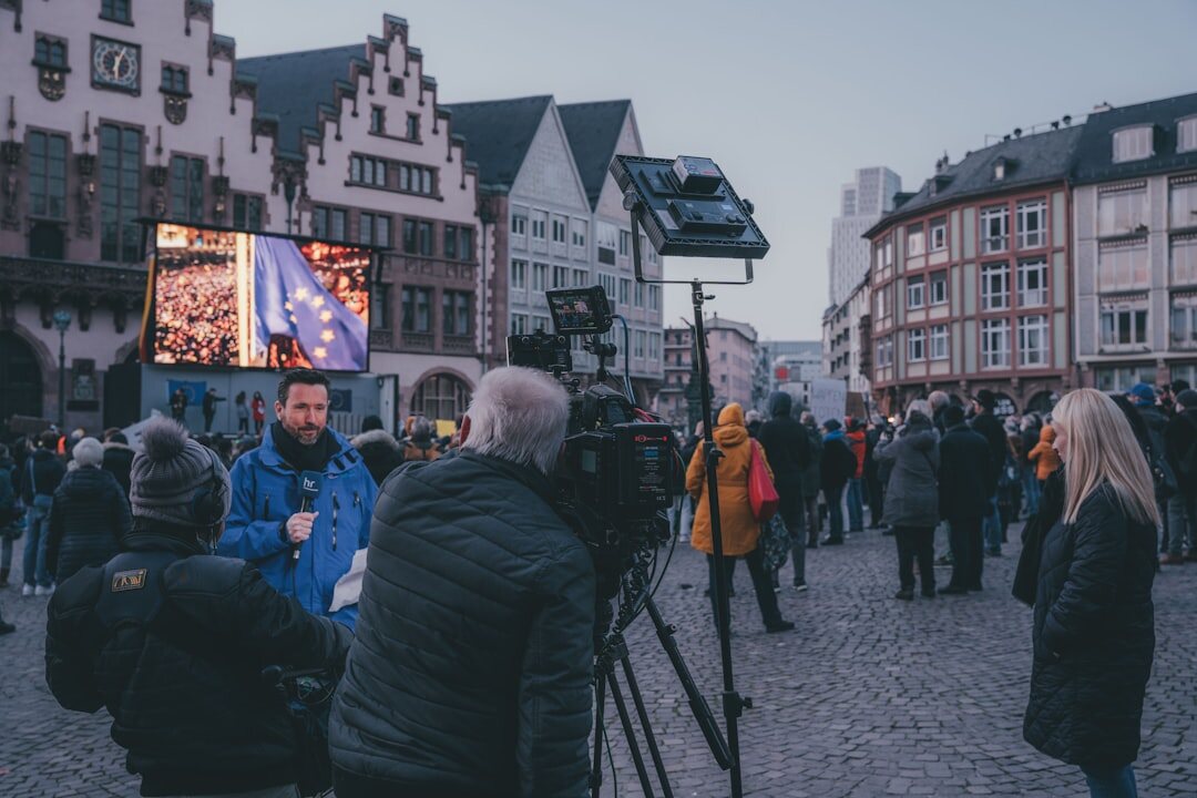Reporter and camera operator working together on a live outdoor segment